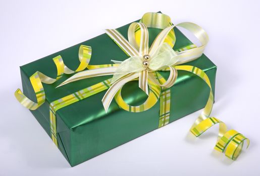  green gift box with ribbon and bow