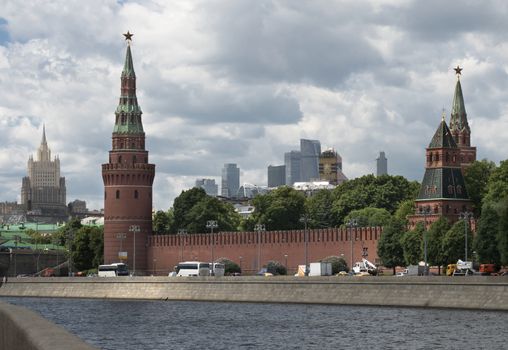 Moscow Russia View on Kremlin Towers and City Complex Skyscrapers in cloudy day.