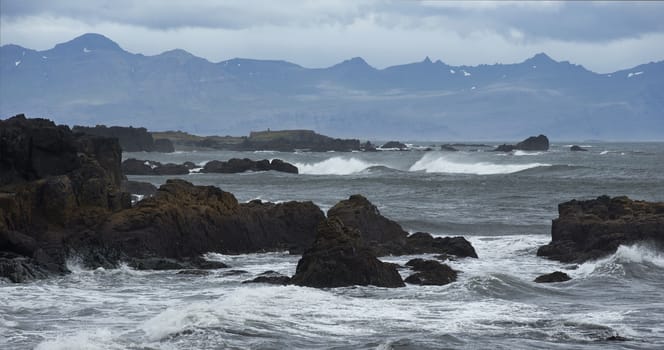 Typical icelandic landscape. Mountains and Seashore of the Atlantic Ocean.