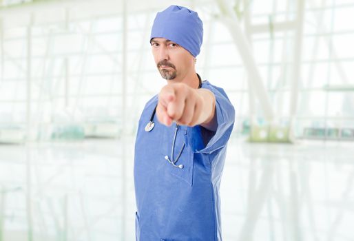 male doctor pointing, at the hospital