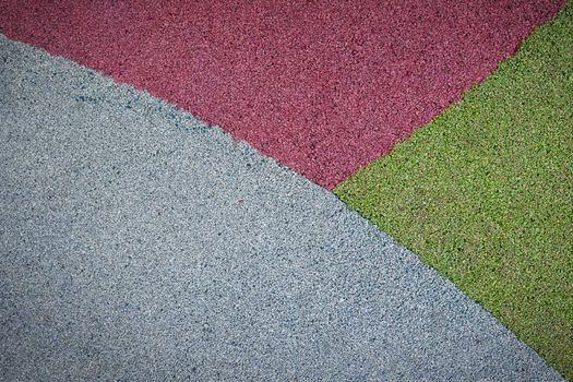 Rubber floor texture. Granules playground cover background.