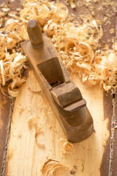 Old wooden hand plane for woodworking.