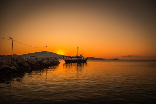 The Fisherman preparing for Sailing for fish at sunrise in sea in the morning in Greece.