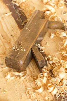 Old wooden hand plane for woodworking.