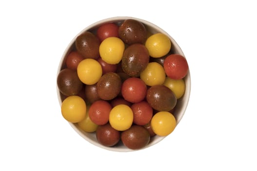 Cherry tomatoes, red,yellow and kamato in ceramic bowl on white background. Top view.