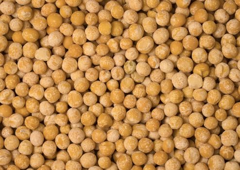 Yellow dry peas as background, close up view.