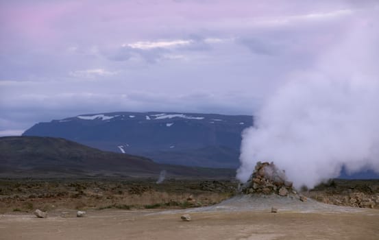 Close up of smoking fumaroles in the geothermal area Hverir, Iceland.