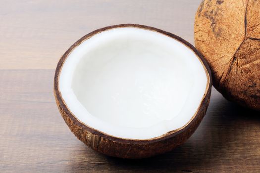 Group of fresh coconuts on wood background. 