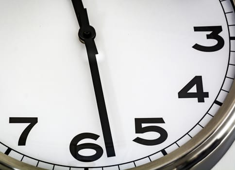 Close-up view of an white analog watch