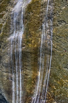 Beautiful waterfall in the Aare Canyon between Meiringen and Innertkirchen, Bernese Alps, Switzerland