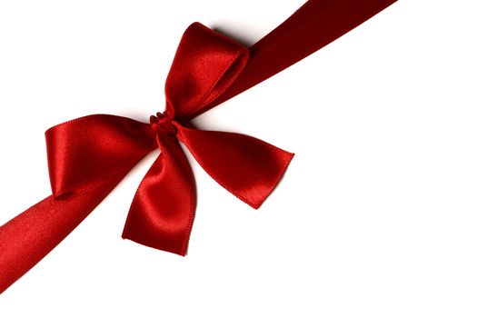 Red gift bow isolated on white background