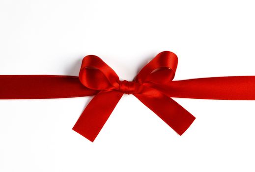 Red gift bow isolated on white background