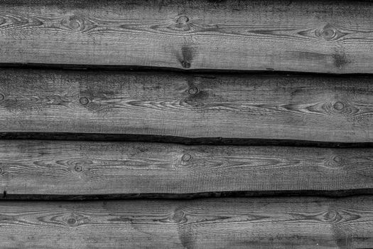 Black wooden boards background. Wall floor or fence exterior design. Natural wood material backdrop