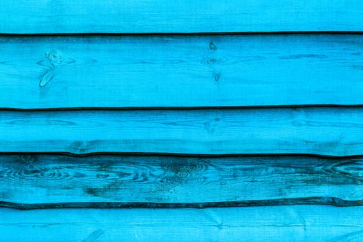 Blue wooden boards background. Wall floor or fence exterior design. Natural wood material backdrop