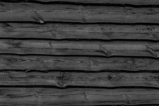 Dark wooden boards background. Wall floor or fence exterior design. Natural wood material backdrop