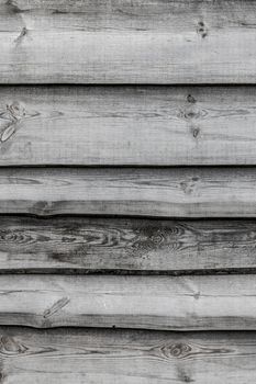 Gray wooden boards vertical background. Wall floor or fence exterior design. Natural wood material backdrop