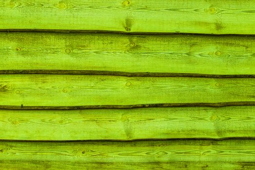 Green wooden boards background. Wall floor or fence exterior design. Natural wood material backdrop