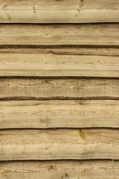 Wooden brown boards vertical background. Wall floor or fence exterior design. Natural wood material backdrop