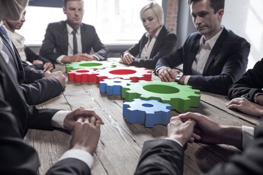 Business people with colorful cogs of business, problem sloution concept