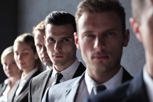 Group of business people standing in a row