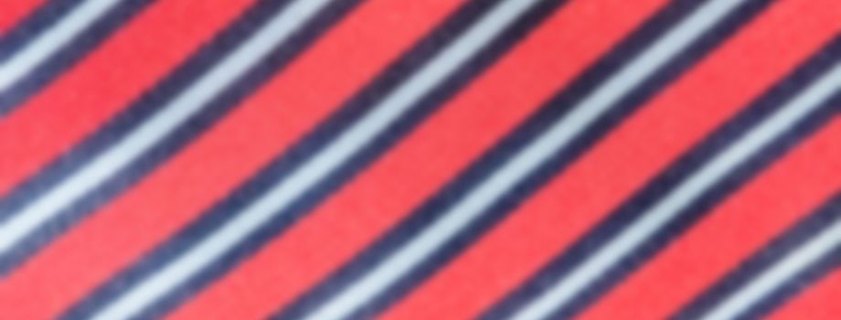 Defocused background of a necktie texture. Intentionally blurred post production for bokeh effect