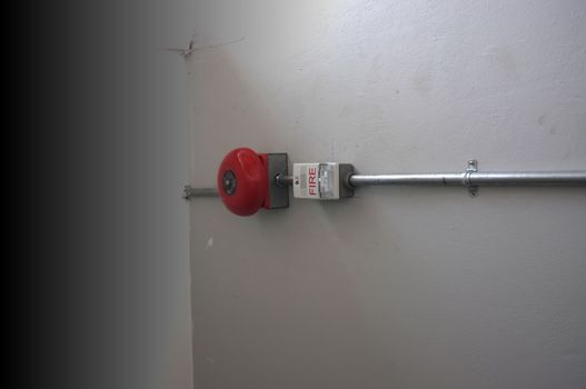 Fire alarm on the wall of shopping center.

