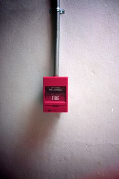 Fire alarm on the wall of shopping center.

