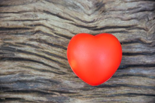 Red heart love on wooden background, valentine day concept