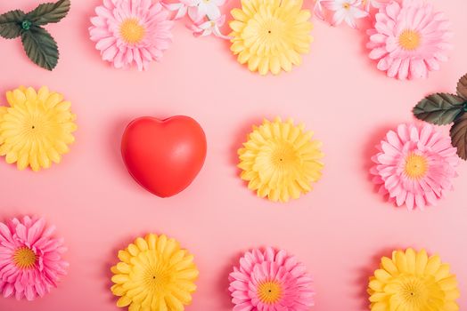 Red heart and flower on pink background with copy space, valentine day concept