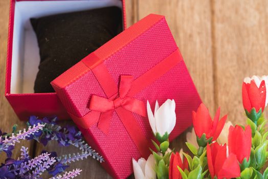Fower and gift box on wooden background with copy space, valentine day concept