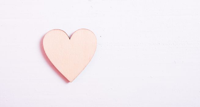 Close up Hearts on white wooden background, valentine day concept