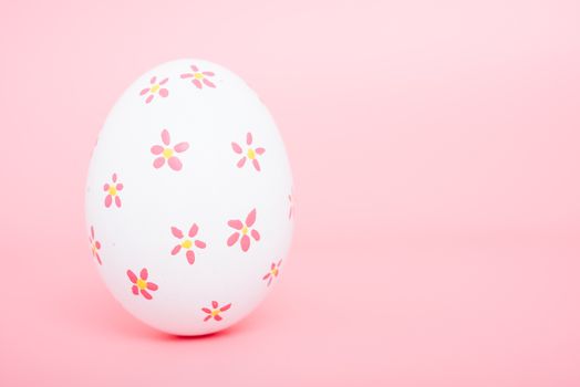 Beautiful Easter White egg color on pink background, Easter day concept
