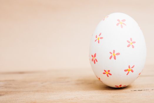 Beautiful Easter White egg on wooden background, Easter day concept