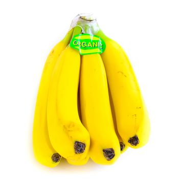 Close-up bright yellow banana cluster isolated on white background. Bunch of fresh bananas with organic label signage, clipping path and copy space