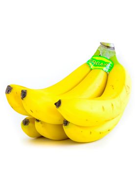 Close-up bright yellow banana cluster isolated on white background. Bunch of fresh bananas with organic label signage, clipping path and copy space