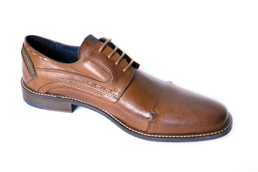 Male brown leather shoe on white background, isolated product, top view.