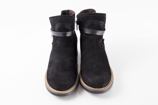 Pair of Female black boots on white background, isolated product.