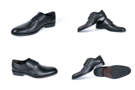 Group of black shoes on white background, isolated product.