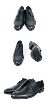 Group of black shoes on white background, isolated product.