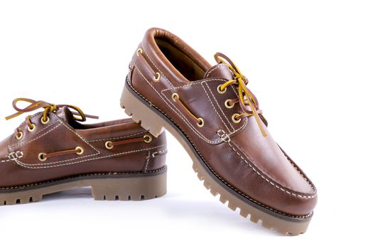 Pair of brown leather shoe on white background, isolated product.