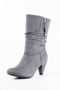 Grey leather boots on white background, isolated product.