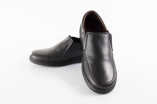 Male black leather shoes on white background, isolated product.