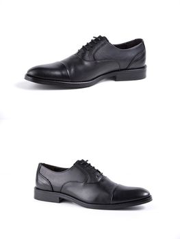 Male black leather shoes on white background, isolated product.