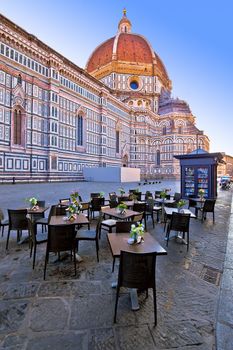 Cafe under Duomo on square in Florence, historic landmark in Tuscany refion of Italy