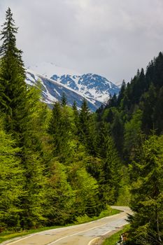 A beautiful scenic road high in the mountains in Romania. Nature background, selective focus