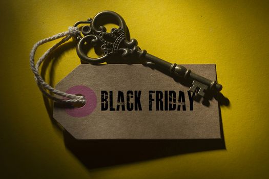 Creative for Black Friday with a label and an old key