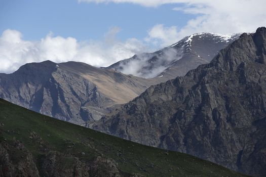 Summer Landscape in the Mountains  Clouds Flying Between Rocks