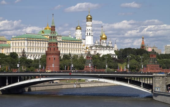 view from the bridge over the river at the center of Moscow and the Kremlin Palace
