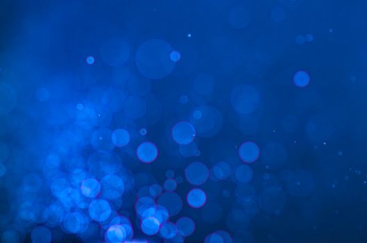 Blue bokeh abstract background.