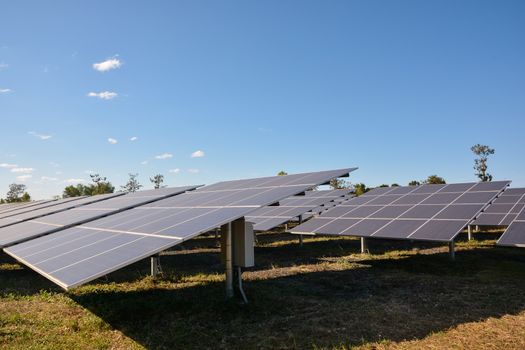 Photovoltaic solar energy panels for renewable electric production with blue sky